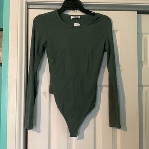 Olive green body suit.